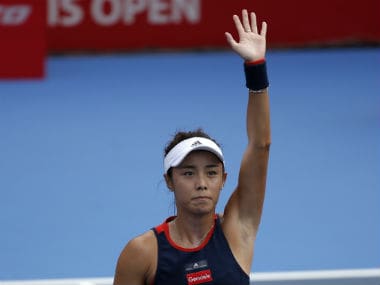 China's Wang Qiang celebrates after beating Elina Svitolina. AFP