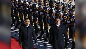 Shinzo Abe welcomed by Li Keqiang near Tiananmen Square; PM's rare China visit comes days before Modi arrives in Japan