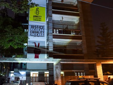 Amnesty India says its structure compliant with Indian laws, alleges govt instilling fear by conducting such raids Amnesty India says its structure compliant with Indian laws, alleges govt instilling fear by conducting such raids