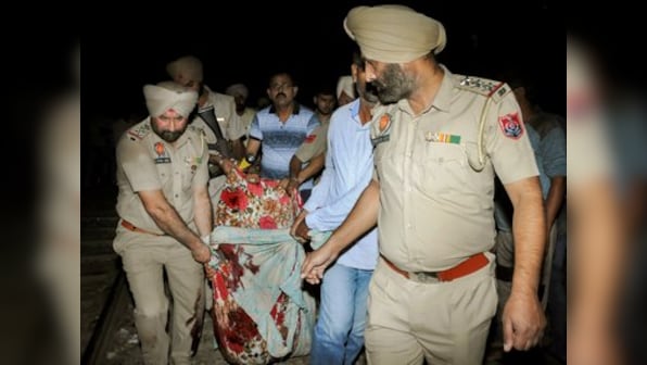 At least 52 people killed in Amritsar after train runs over people watching burning of Ravana effigy