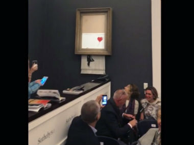 British street artist Banksy shocks art world by shredding work worth 1 million pounds at auction in London British street artist Banksy shocks art world by shredding work worth 1 million pounds at auction in London