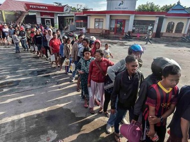 Indonesia earthquake: Mass graves to be prepared to curb spread of disease; rescue workers say access 'huge issue' for relief efforts Indonesia earthquake: Mass graves to be prepared to curb spread of disease; rescue workers say access 'huge issue' for relief efforts