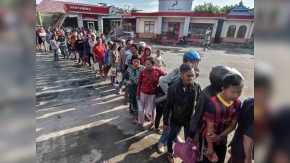 Indonesia earthquake: Mass graves to be prepared to curb spread of disease; rescue workers say access 'huge issue' for relief efforts