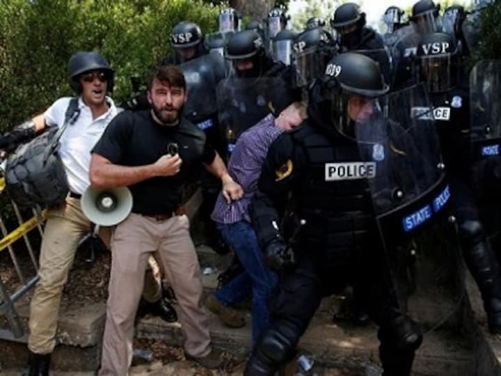 US authorities charge four members of neo-Nazi movement with inciting violence in 2017 Virginia case that saw one person killed
