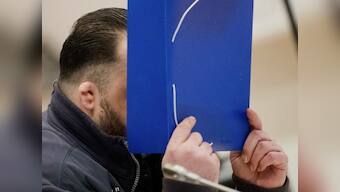 German nurse Niels Hoegel admits to killing 100 patients as trial opens; prosecutors say serial killer was motivated by vanity, boredom