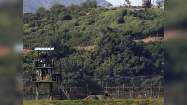 South Korea begins removing mines along border, expects North Korea to do same
