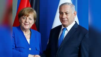 Angela Merkel and Benjamin Netanyahu hold talks to publicly brush aside past differences, promote Germany-Israel cooperation