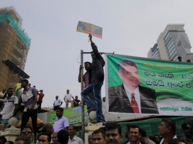 Supporters of former Sri Lanka PM protest against his sacking in Colombo, burn effigies of President Maithripala Sirisena Supporters of former Sri Lanka PM protest against his sacking in Colombo, burn effigies of President Maithripala Sirisena