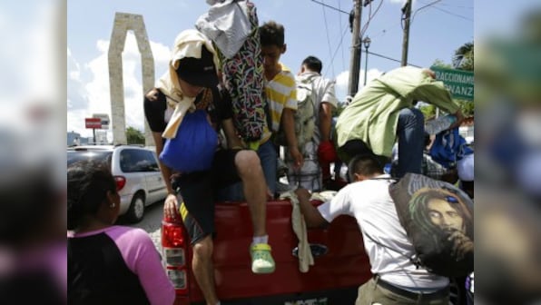 Caravan migrants arrive in Mexico City on way to US border as Donald Trump makes their journey central campaign issue