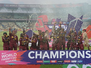 West Indies cricketers celebrate after winning the women's World T20 cricket tournament final match between Australia and West Indies at The Eden Gardens Cricket Stadium in Kolkata on April 3, 2016. / AFP PHOTO / Indranil MUKHERJEE