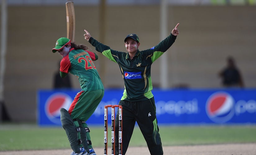 Pakistani cricketer Anam Amin (R) celebrates after taking wicket of Bangladeshi cricketer Jahanara Alam (L) during the first women’s One Day International (ODI) cricket match between Pakistan and Bangladesh at the Southend Club in Karachi on October 4, 2015. AFP PHOTO / Asif HASSAN (Photo by ASIF HASSAN / AFP)