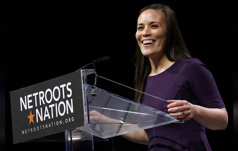 Gina Ortiz Jones addresses a conference in New Orleans. Reuters
