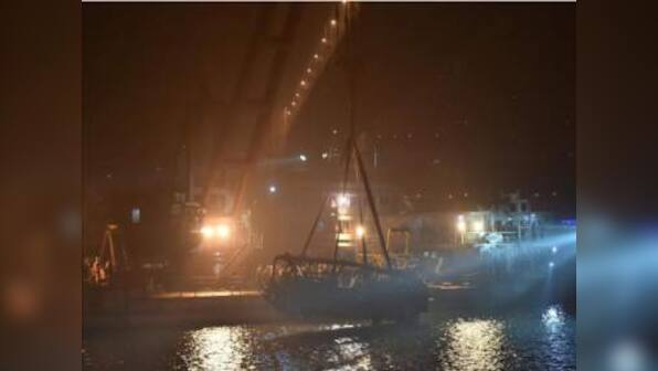 Bus falls into China's Yangtze river after fistfight between female passenger and driver; 13 people killed