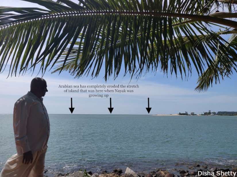 TH Nayak’s extended family owned land on the Pavinakurve island (in background), which has now been eroded by the Arabian sea in northwestern Karnataka. Image courtesy: Disha Shetty