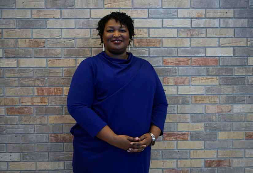 Stacey Abrams, the Democratic gubernatorial candidate for Georgia poses for a photo before addressing a crowd in Riverdale. Reuters