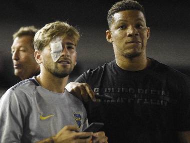 Copa Libertadores final: Second leg postponed by a day after Boca Juniors' bus gets attacked by River Plate fans Copa Libertadores final: Second leg postponed by a day after Boca Juniors' bus gets attacked by River Plate fans