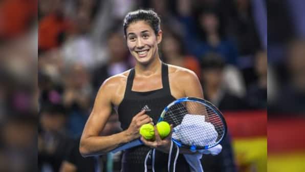 WTA Elite Trophy: Garbine Muguruza saves three match points against Anastasija Sevastova to reach semi-finals
