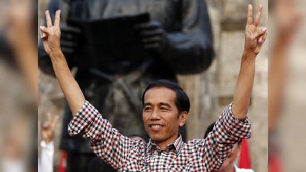 Indonesia's Joko Widodo gets re-elected as president; additional security forces deployed amid fears of unrest