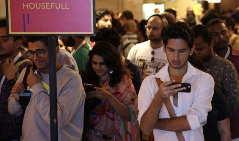 MAMI 2018 festival attendees wait in a queue for entry to a screening. Image via Facebool