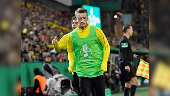 Marco Reus sits out of Germany training session due to foot injury sustained in Borussia Dortmund's win over Bayern Munich