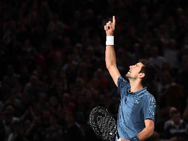 Serbia’s Novak Djokovic celebrates after beating Roger Federer. AFP