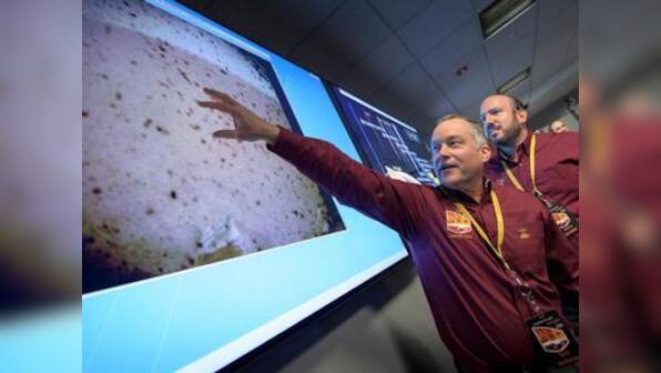 NASA's InSight lands on Mars; Twitter is obsessed with scientists' 'crazy handshake dance' and the 'cool hat guy'