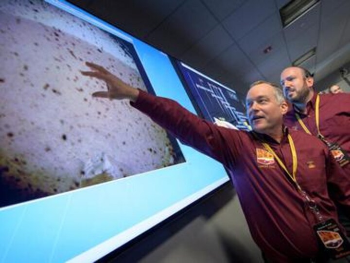 NASA's InSight lands on Mars; Twitter is obsessed with scientists' 'crazy handshake dance' and the 'cool hat guy'