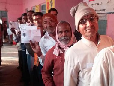   Voters line up at a polling station in Neemuch. Team 101 Reporters 