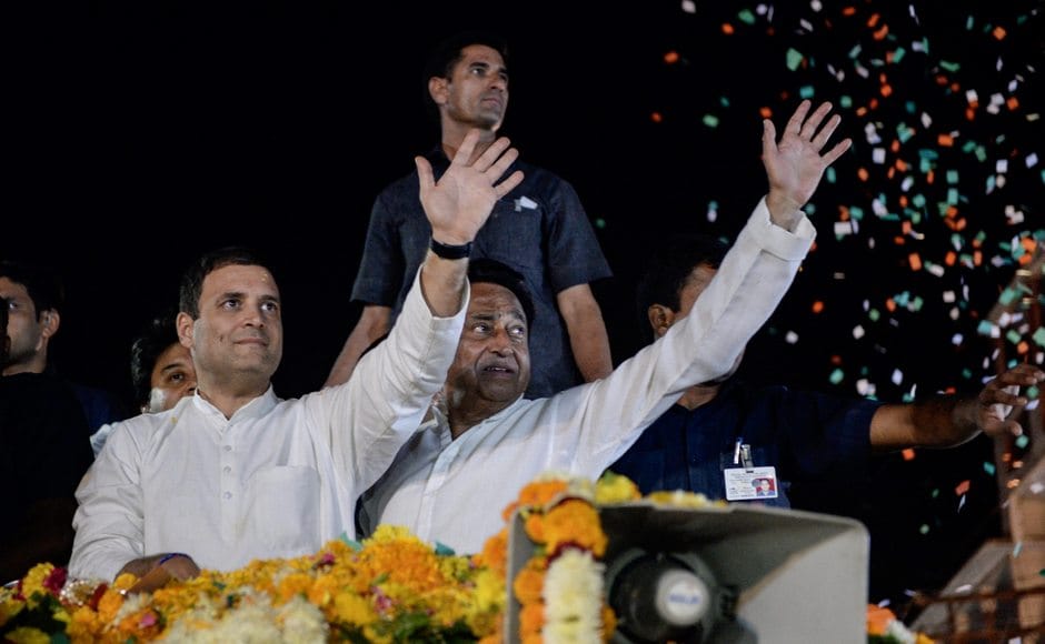 Rahul along with party's state president Kamal Nath greeted supporters during a roadshow in Indore. PTI Rahul along with party's state president Kamal Nath greeted supporters during a roadshow in Indore. PTI