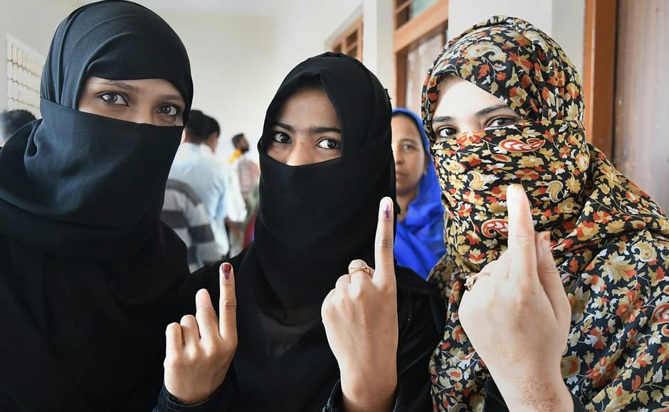 File photo of voters at a polling booth in Mahdya Pradesh. PTI