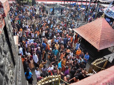 Sabarimala standoff: Two women brought back to Pampa camp amid protests; duo was within a kilometre of Sannidhanam Sabarimala standoff: Two women brought back to Pampa camp amid protests; duo was within a kilometre of Sannidhanam
