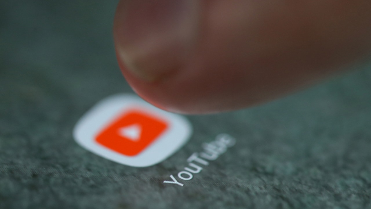 The YouTube app logo is seen on a smartphone in this picture illustration taken September 15, 2017. REUTERS/Dado Ruvic/Illustration - RC1F9FACE150