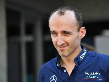 Robert Kubica talks to journalists ahead of the Abu Dhabi Grand Prix. AFP