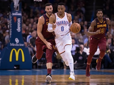 Nov 28, 2018; Oklahoma City, OK, USA; Oklahoma City Thunder guard Russell Westbrook (0) dribbles past Cleveland Cavaliers forward Larry Nance Jr. (22) during the third quarter at Chesapeake Energy Arena. Mandatory Credit: Rob Ferguson-USA TODAY Sports - 11751680