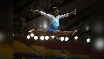 World Gymnastics Championships: Simone Biles wins unprecedented 4th all-around title despite kidney stone problem