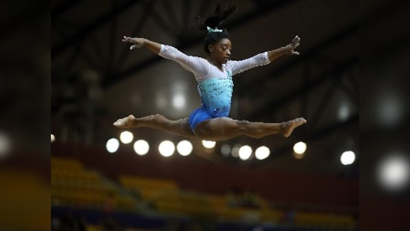 World Gymnastics Championships: Simone Biles wins unprecedented 4th all-around title despite kidney stone problem
