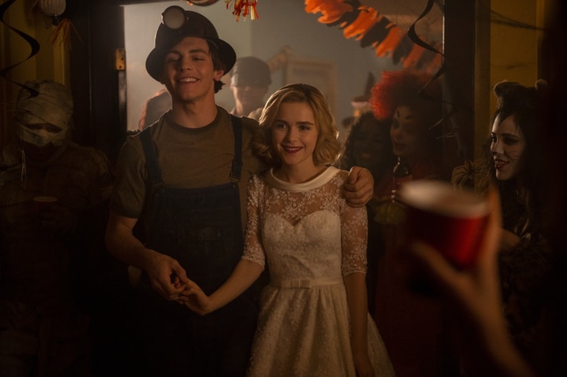 Sabrina and her boyfriend Harvey Kinkle (Ross Lynch) at the H̶a̶l̶l̶o̶w̶e̶e̶n̶ birthday party. Netflix