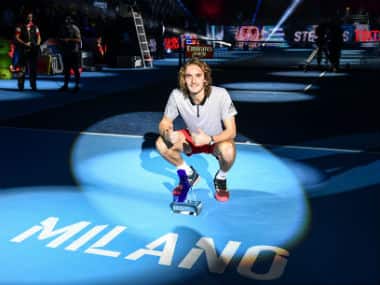 Greece’s Stefanos Tsitsipas poses with his trophy after defeating Australia’s Alex De Minaur to win the men’s final of the Next Generation ATP Finals in Milan. AFP 