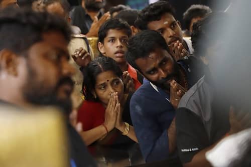 Lalitha prayed at the temple after being allowed to enter the premises on confirmation of her age. Image courtesy: TK Devasia