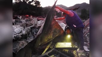 Toll in California wildfires rises to 29, making it deadliest in state's history; 250,000 people forced to flee homes