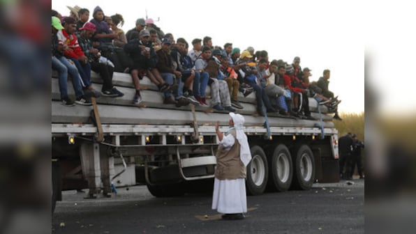 Migrant caravan groups, which were Donald Trump's midterm election drumbeat, begin arriving at hardened US border