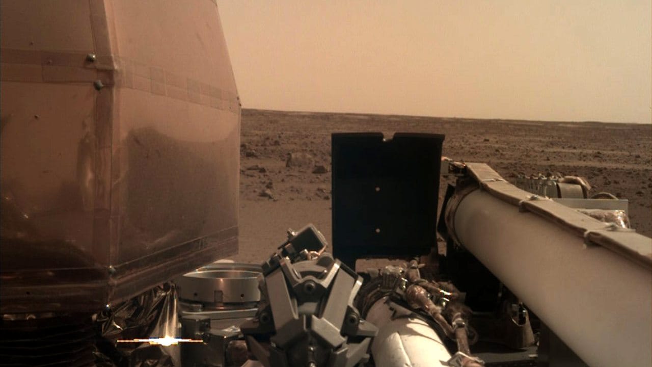InSight took this image using its robotic arm-mounted, Instrument Deployment Camera (IDC) on the day it landed. All the instruments in the frame are parts of the lander's onboard experiments. Image courtesy: NASA