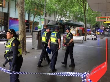 Police officers at Bourke Street mall in central Melbourne, Australia, where a knife-wielding man attacked civilians last week. Reuters