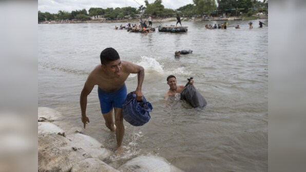 As migrant caravan endures 'route of death' en route US, trekkers condemn organisers for broken promises of bus transport