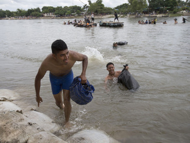 As migrant caravan endures 'route of death' en route US, trekkers condemn organisers for broken promises of bus transport As migrant caravan endures 'route of death' en route US, trekkers condemn organisers for broken promises of bus transport