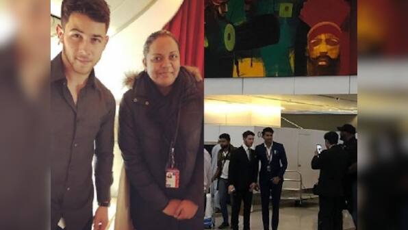 Nick Jonas poses with Indian fans after his arrival in country for upcoming nuptials with Priyanka Chopra
