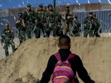 US briefly shuts San Ysidro border as migrants try to cross over from Mexico; tear gas used to disperse crowd