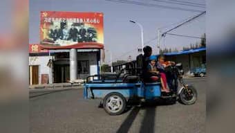 China's Uighur Muslims told to share bed, meals with govt-appointed Han relatives as party infiltrates homes to spy on community