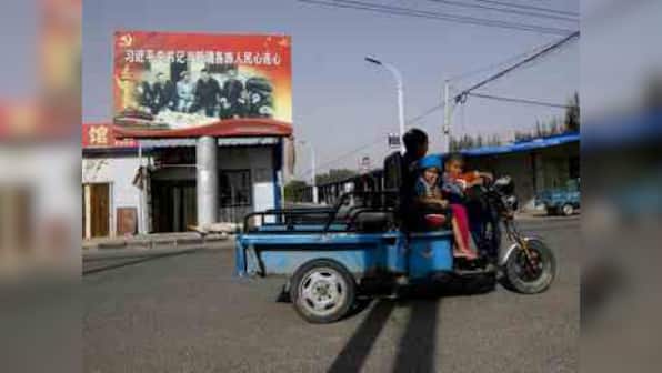 China's Uighur Muslims told to share bed, meals with govt-appointed Han relatives as party infiltrates homes to spy on community