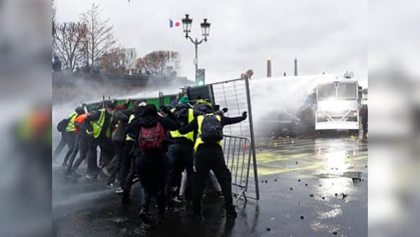 France agitation: Tear gas, water cannons used to disperse mob protesting rising taxes; 63 arrested in Paris